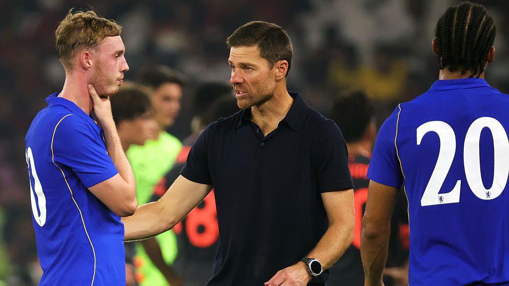 Xabi Alonso and Cole Palmer