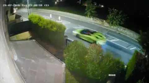 A green supercar spotted on CCTV footage