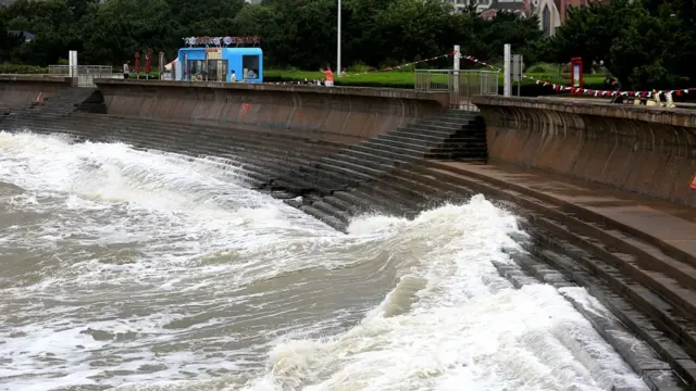 High waves crash near Daquangou Fishing Port in Shandong province