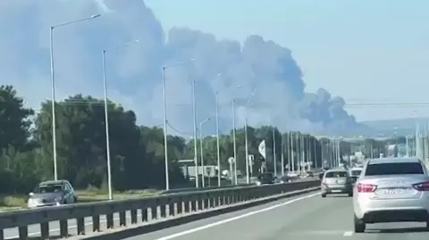 Zelenskiy / Official A screenshot from footage posted by Ukrainian President Volodymyr Zelensky said to show a column of smoke rising in one of Russia's regions after Ukrainian overnight strikes. Photo: 2 August 2026