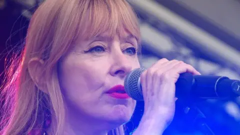 Nic Rigby/BBC Suzanne Vega performing at the Cambridge Folk Festival
