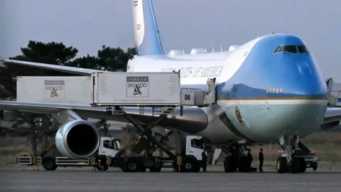Getty Images A catering truck parked alongside the old Air Force One jet prior to departure from Ankara 
