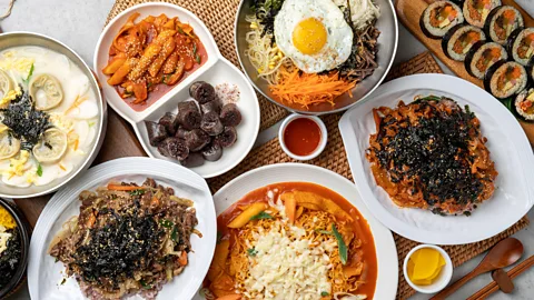 Alamy A variety of Korean dishes and banchan on a table (Credit: Alamy)