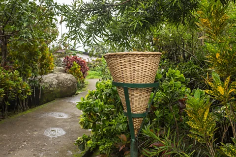 Alamy Residents use hand-woven bamboo bins to keep the village free of litter (Credit: Alamy)