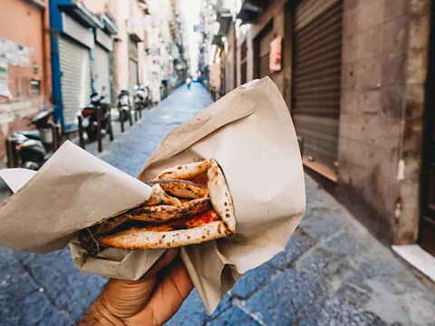 Getty Images When visiting Italy, always make a point to try the region's local foods (Credit: Getty Images)