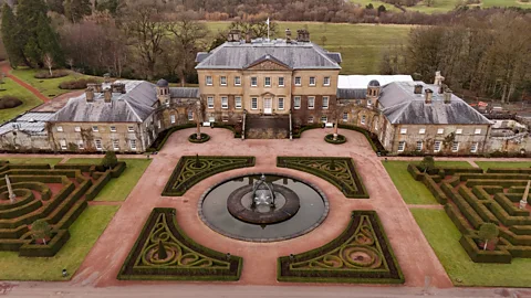 Getty Images Aerial view of Dumfries House in East Ayrshire showing the Palladian mansion, formal gardens and central fountain (Credit: Getty Images)